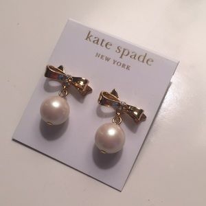 Kate Spade pearl gold bow earrings.